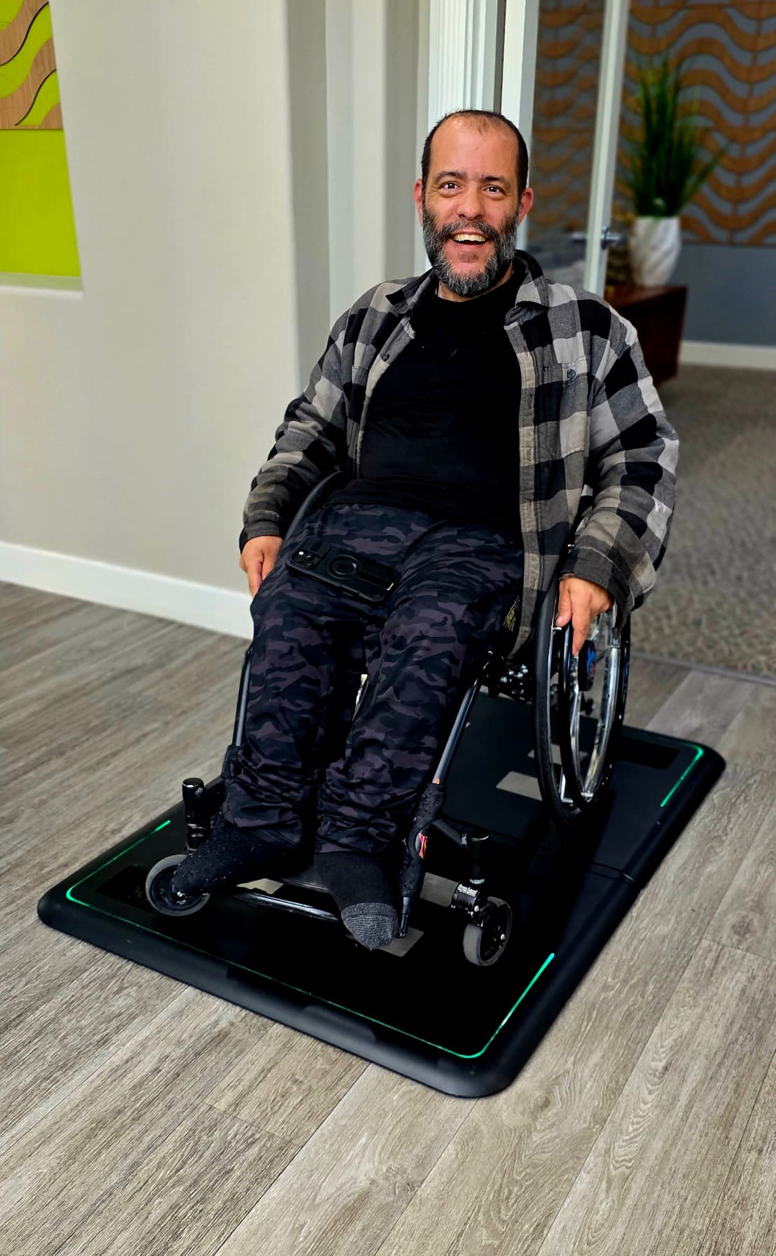 Wheelchair user's feet and chair positioned on Fold